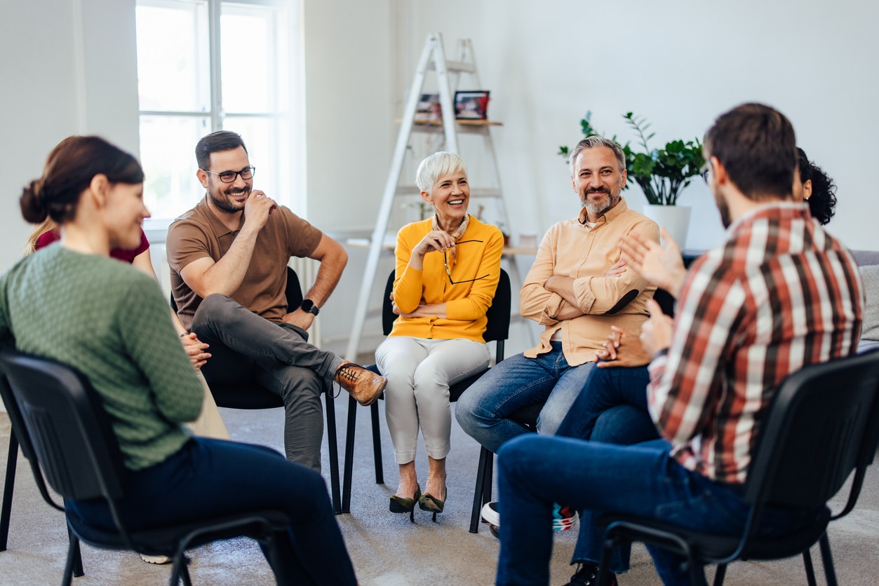 Smiling group of people of different ages